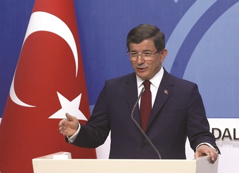 Turkish Prime Minister Ahmet Davutoglu gives a press conference after an executive board meeting of his Justice and Development Party in Ankara yesterday.