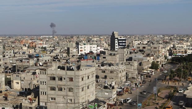 Smoke rises following an Israeli air strike in Rafah, in the southern Gaza Strip, on Thursday.