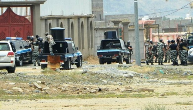 Members of Saudi security forces are seen during the Makkah raid