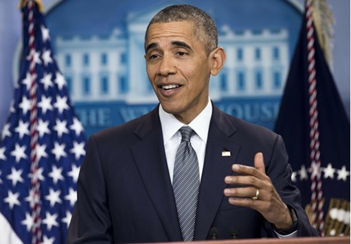 US President Barack Obama speaks about the economy and answers questions in the Brady Press Briefing Room at the White House in Washington, DC, yesterday.