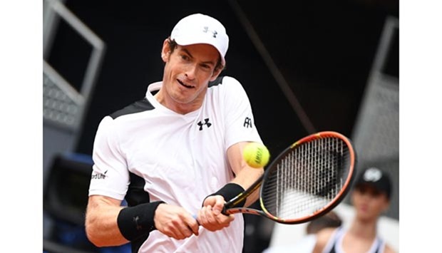 Andy Murray returns a ball to Rafael Nadal during the menu2019s semifinal of Madrid Open on Saturday.