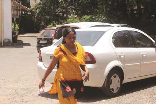 Rosy Feroor, the third accused in the rape and human trafficking of a teenaged girl, arrives at the Crime Branch office in Panaji yesterday.