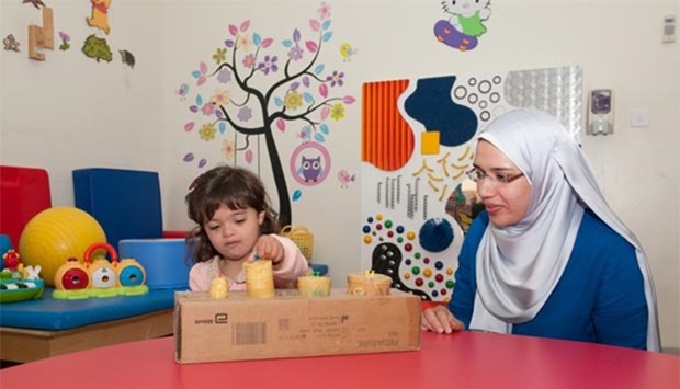 Zahrat al-Hayat with her mother