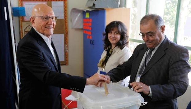 Lebanon's Prime Minister Tammam Salam casts his ballot at a polling station during Beirut's municipal elections on Sunday.