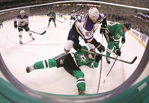 Alex Pietrangelo (No 27) of the St. Louis Blues battles for control of the puck against Cody Eakin (No 20) of the Dallas Stars and Patrick Sharp (No 10) of the Dallas Stars in the third period in Game Five of the Western Conference Second Round during the 2016 NHL Stanley Cup Playoffs at American Airlines Center in Dallas. (Getty Images/AFP)