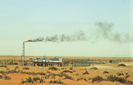 A picture taken on June 23, 2008 shows a flame from a Saudi Aramco oil facility known as u201cPump 3u201d in the desert near the oil-rich area of Khouris, 160km east of the Saudi capital Riyadh. Saudi Arabiau2019s new energy minister said yesterday the worldu2019s largest crude exporter is committed to meeting demand for hydrocarbons from its customers and would maintain its petroleum policies.