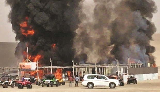 The fire at the motorcycle rental shop.