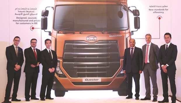 Jaidah Equipment and UD Trucks officials at the launch of Quester trucks in Qatar.