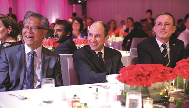 Akbar al-Baker with Hieu Van Le and Martin Haese at the Qatar Airways gala celebration.