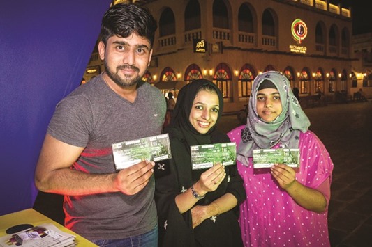 Fans with their Emir Cup tickets at Souq Waqif.