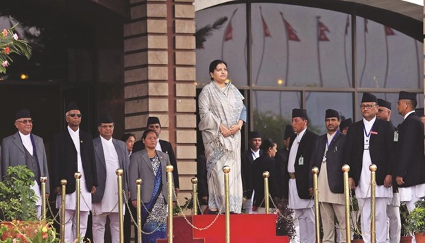 Bidhya Devi Bhandari inspects the guard of honour before presenting the governmentu2019s annual policy and programme for the next fiscal year 2016/17 at parliament in Kathmandu. The document mainly focused on the implementation of the constitution and federalism and the acceleration of post-quake reconstructions.