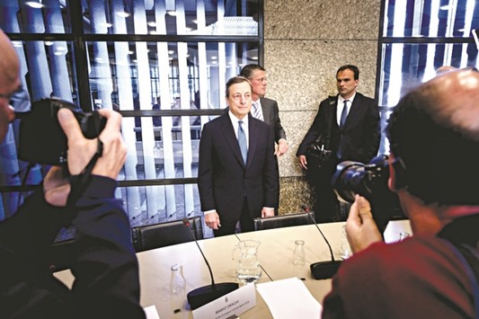 ECB president Mario Draghi looks on during a visit to the Senate in The Hague, The Netherlands yesterday. Addressing the Dutch parliament yesterday, Draghi said eurozoneu2019s recovery u201chas evolved from being fragile and uneven into a firming, broad-based upswing,u201d though u201cit is too early to declare success.u201d