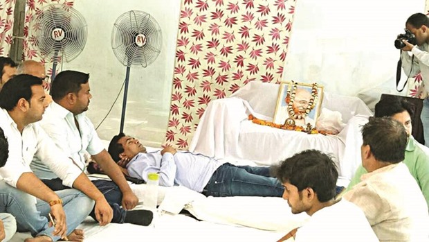 Sacked Delhi minister Kapil Mishra lies in bed as he stages a hunger strike at his home in New Delhi yesterday.