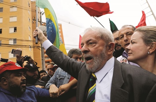 Former Brazilian president Luiz Inacio Lula da Silva arrives at the Federal Justice for a testimony in Curitiba, Brazil, yesterday.