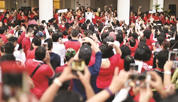 Supporters of Basuki Tjahaja Purnama, also known as Ahok, gather for a Cityhall Choir in Jakarta yesterday to show their concern over Ahoku2019s conviction.
