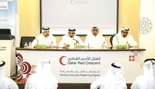 QRCS officials addressing members at the annual general body meeting held recently.