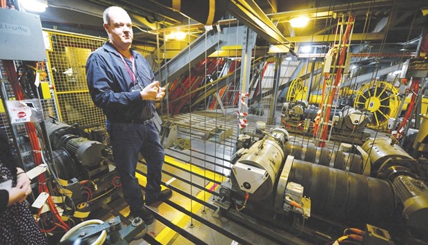 Sydney Opera House technical manager Philby Lewis speaks to the media in the engine room of the Joan Sutherland Theatre inside the Sydney Opera House in Sydney.