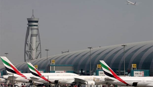 Emirates aircraft are seen at Dubai International Airport,