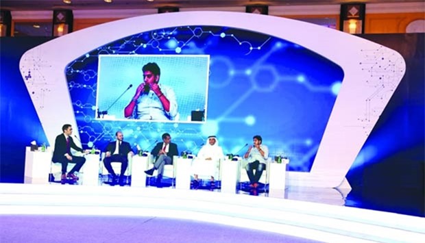 A panel discussion in progress at the media summit.