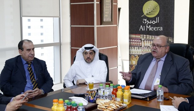 Cobus Lombard (right), together with other Al Meera officials, at a press conference.