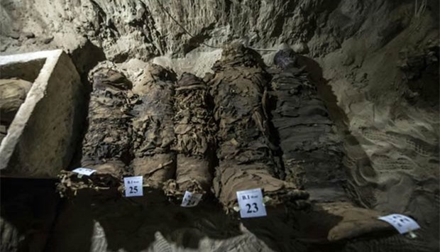 Mummies are lying in catacombs following their discovery in the Touna el-Gabal district of the Minya province in central Egypt.