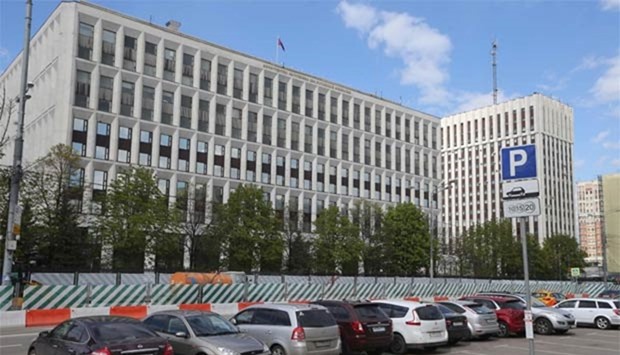 Cars are parked in front of the Russian Interior Ministry building on Saturday in Moscow. The ministry said that some of its computers had been hit by a ,virus attack, amid reports of major cyber attack across the globe on Friday.