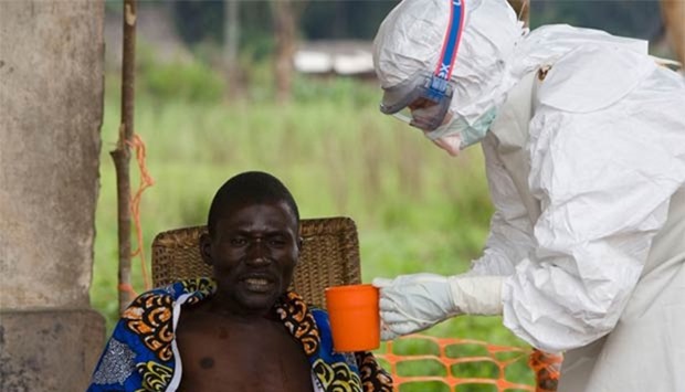 A Doctors Without Borders doctor is seen with an Ebola patient in this file picture.