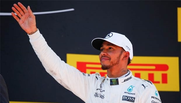 Lewis Hamilton waves after his victory in the Spanish Grand Prix on Sunday.