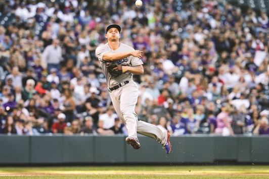 Los Angeles Dodgers shortstop Corey Seager (5) during the second inning against the Colorado Rockies at Coors Field.