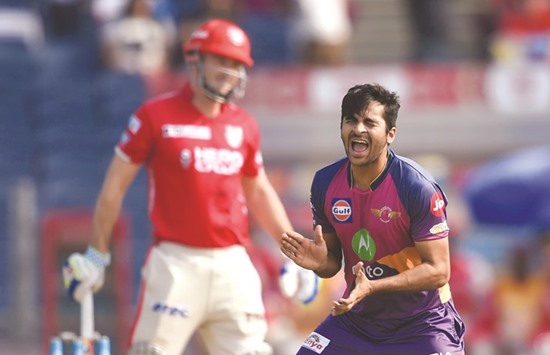 Rising Pune Supergiantu2019s Shardul Thakur celebrates the wicket of Kings XI Punjabu2019s Shaun Marsh during the Indian Premier League match in Pune yesterday. (AFP)