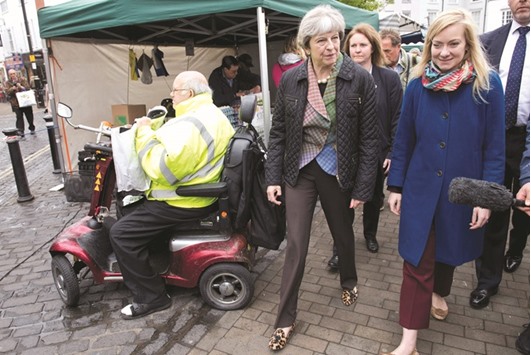 Prime Minister Theresa May makes a campaign visit to Abingdon Market near Oxford yesterday.