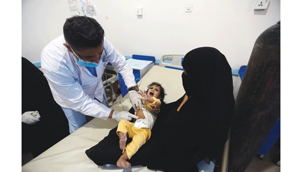 A Yemeni child, suspected of being infected with cholera, receives treatment at a hospital in Sanaa yesterday.