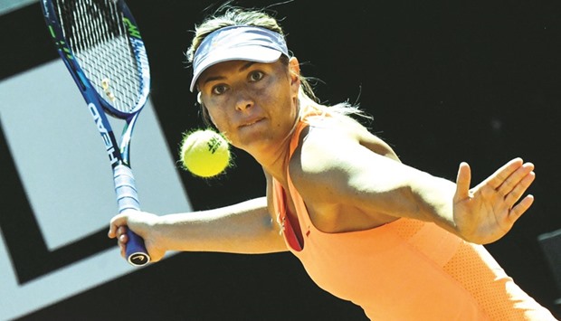 Maria Sharapova returns the ball to Christina McHale during their Italian Open match at the Foro Italico in Rome yesterday. (AFP)