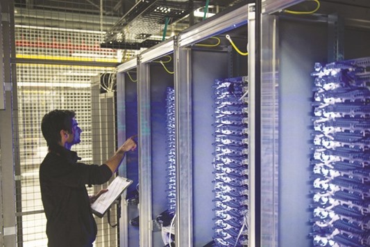 An employee of Equinix data centre checking servers in Pantin, a suburb north of Paris in the Seine-Saint-Denis department. Investors treated the attack as a buying opportunity for security stocks rather than a cause for concern over the risk it posed to companies.