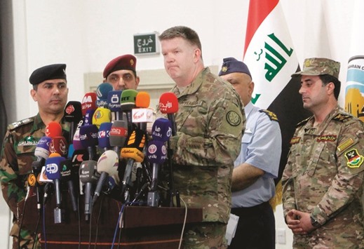 Colonel John Dorrian, the spokesman for the US-led international coalition against the Islamic State (IS) group, holds a press conference in Baghdad yesterday.