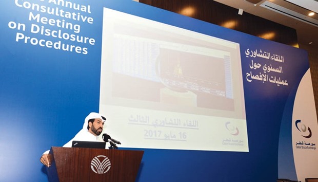 Al-Mansoori outlining the importance of transparency and adequate disclosure for QSE-listed companies.