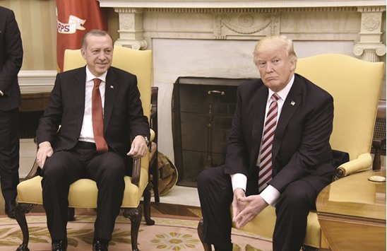 US President Donald Trump meets with President Recep Tayyip Erdogan of Turkey in the Oval Office.