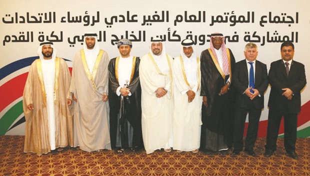 Ahmed Eid (third from right), QFA president Sheikh Hamad bin Khalifa bin Ahmed al-Thani (fourth from right) and other officials attend the opening of the Khalifa International Stadium recently.
