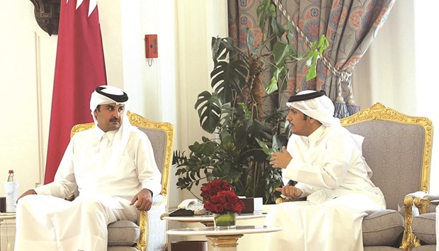 HH the Emir Sheikh Tamim bin Hamad al-Thani and HE the Foreign Minister Sheikh Mohamed bin Abdulrahman al-Thani during their meeting with the heads of diplomatic missions of Qatar abroad.