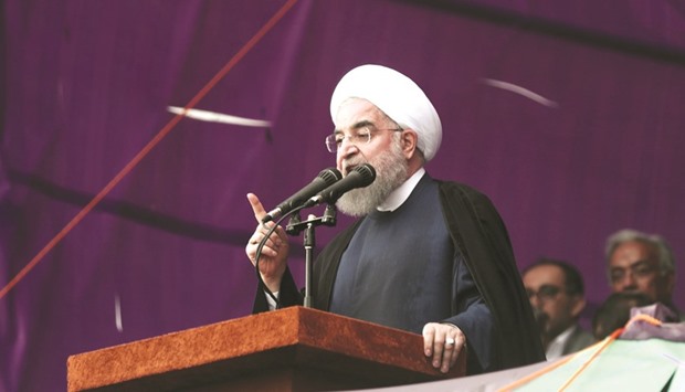 Iranian President and candidate in the upcoming presidential elections Hassan Rouhani gives an address at a campaign rally in Takhti stadium in the northeastern city of Mashhad yesterday.
