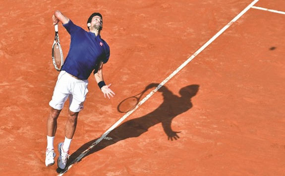 Novak Djokovic of Serbia serves to Roberto Bautista during their third round match at the Rome Masters yesterday. (AFP)