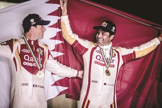 Nasser Saleh al-Attiyah (right) and co-driver Matthieu Baumel have an excellent chance to grab the championship lead in Kazakhstan.