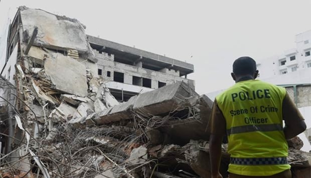 The seven-story building collapsed during construction in Colombo, on Friday.