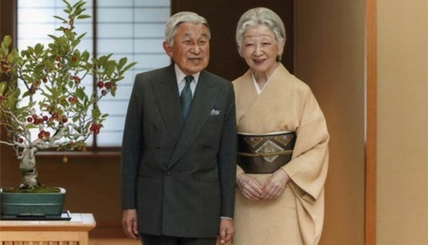 Japan's Emperor Akihito exchanges smiles with Empress Michiko at the Imperial Palace in Tokyo, in this September 2015 file photo.