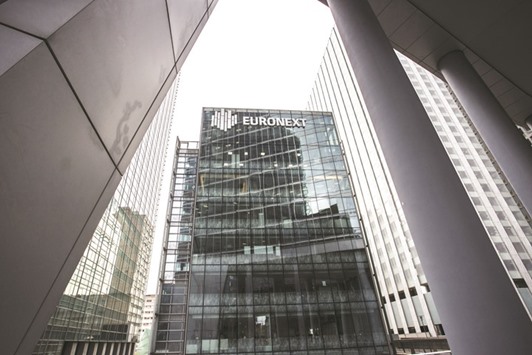 The Euronext logo is seen on the exterior of the Paris stock exchange. The CAC 40 gained 0.7% to 5,324.40 points yesterday.