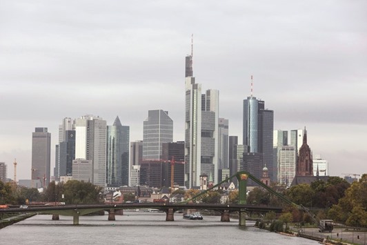 Skyscrapers stand on the city skyline in the financial district beyond the River Main in Frankfurt. The exception to Germanyu2019s strict labour rules is intended as a sweetener for global banks who want to move staff to the continent after Brexit, but are worried about laws making it hard to sack them.