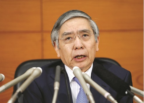 Bank of Japan governor Haruhiko Kuroda attends a news conference at the BoJ  headquarters in Tokyo. The central bank faces a tricky balancing act, according to  people familiar with its policymakersu2019 thinking, as it must convince people it has a  credible exit strategy without destabilising the bond market by giving too much away.