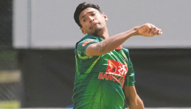 Bangladeshu2019s Mustafizur Rahman bowls during an ODI tri-nation series against Ireland at the Malahide Cricket Club in Dublin yesterday. (AFP)