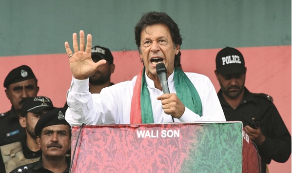PTI chief Imran Khan acknowledges his supporters during an anti-government rally in Quetta yesterday.