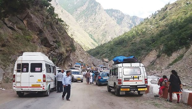 More than 25,000 people en route to Badrinath in Uttarakhand are reportedly stranded after a landslide blocked a highway, officials said yesterday.